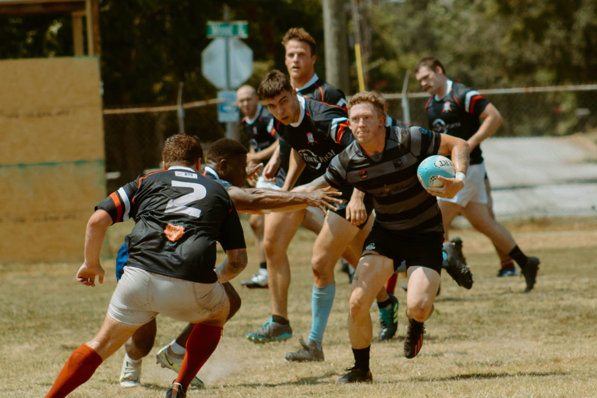 A Columbia Rhinos ball carrier attacking the defensive line